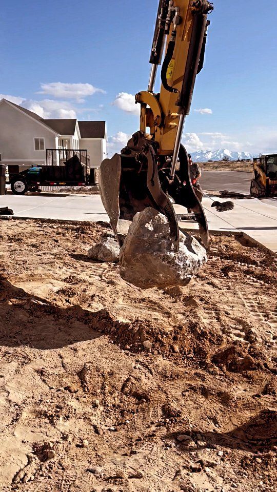 Boulder retaining walls to dress up the front planter area 🪻🪨🌻

#woodwardco #boulders #landscape #saltlakecity